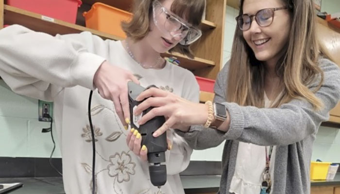 Students in rural Kentucky "Dive Deep into Marine Biology" through a new STEM curriculum featuring an engineering design challenge to construct and fly remotely operated vehicles. Image courtesy of Emily McAfee.