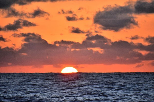 Sunset over the Bahamas from the ship deck.