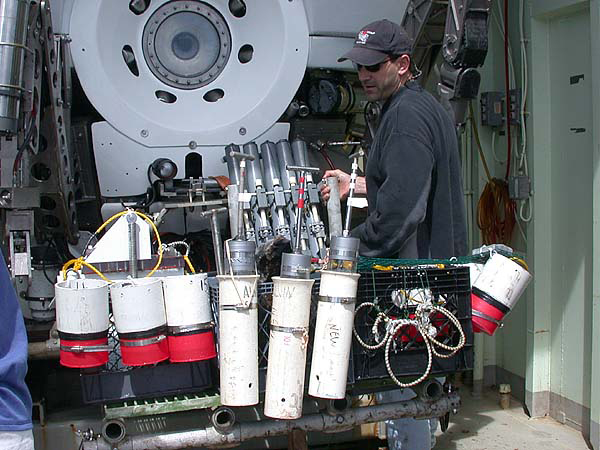 Detaching Niskin bottles after dive