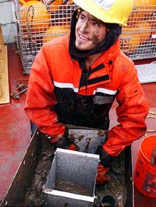 Casey Debenham processing the box core sample