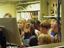 Students watch a virtual Hudson Canyon fly-over simulation put together by scientist Tammie Middleton.