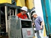 Lucas Cribley and Geoff Ellett making adjustments to the ROV