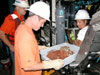 Sonsub Inc. crewmember Lucas Cribley and Greg Wardwell assisting Tara Pitts samples.