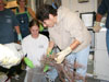 Priscilla Winder (left) and Shirley Pomponi (right) placing samples in plastic bags for preservation.