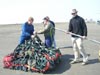 Members of the Healy crew and aviation division work together to secure equipment for the airlift.