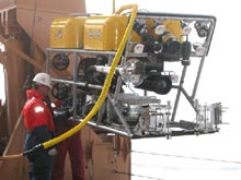 DSSI's Jerry Caba conducts a final check of the ROV systems before deployment.