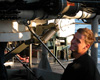 Dr. Murray Roberts prepares to enter the stern compartment of the Johnson-Sea-Link submersible.