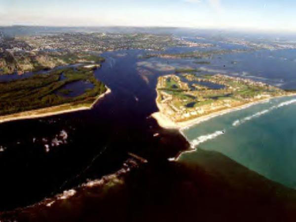 Figure 2: Sailfish Point, Florida, where the St. Lucie River flows from the inlet into the Atlantic Ocean, revealing the impact of siltation on near-shore reef formations in the Atlantic Ocean. This image shows the demarcation between fresh water from Lake Okeechobee after Hurricane Frances.