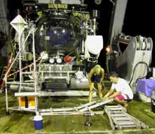 Graduate student Erika Raymond and visiting scientist, Justin Marshall, begin to devise the CLAM