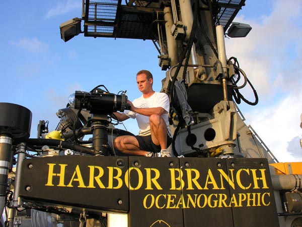 Lee Frey readies the LoLAR II instrument for deployment on the JSL submersible.