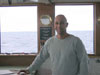 Captain Ross Barnes on the bridge of the R/V Kaimikai-O-Kanaloa.