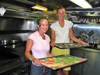 Acoustic technicians, Jamie Smith and Jennie Morgan, bake sugar and gingerbread cookies for the holidays.