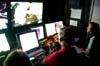 Todd Gregory of the University of Rhode Island (URI) pilots the ROV Hercules.