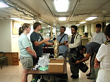 Kate Buckman and Giora Proskurowski, both of the Woods Hole Oceanographic Institution, describe the science associated with the Lost City hydrothermal vent fields and a partial chimney from the vent fields to the Azorian press.