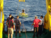 HCMR diver and backup Thetis pilot Vasilis Stasinos secures recovery lines to Thetis.