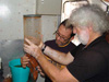 HCMR geologists Christos Anagnostou and Andreas Siolas gather samples collected by the Thetis for additional lab analysis.