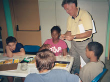 Marcus, Nicole, Brandon, and Jacob learn about corrosion by experimenting with nails