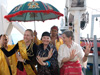 Talina, Caron, and Peggy in borrowed finery amuse our shipmates and our guests from Tawi-Tawi after the exhibition of traditional Muslim dances. 