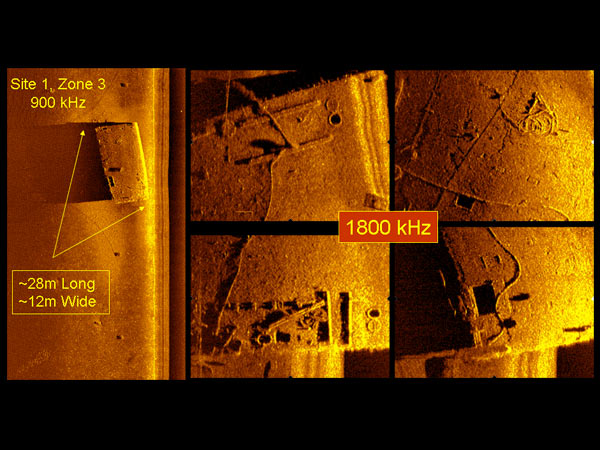 This target found in Area 1 by an REMUS 100 SW AUV with a duel frequency side-scan sonar may be a barge but, its identification has not been verified.