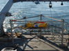 A bottom-resting tripod, equipped with a suite of sensors sits on the deck of the Laurentian awaiting deployment near the Isolated Sinkhole.