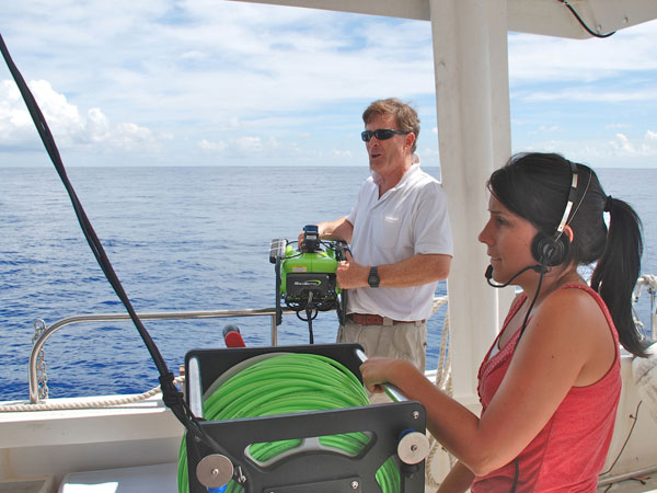 A wireless headset allows CSUMB graduate student, Krystle Gomez, working on the back deck to communicate with the ROV pilot and ensure a smooth deployment of the ROV.  