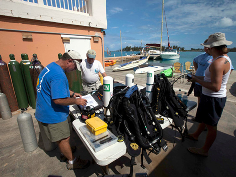 Brian Kakuk uses his pre dive check sheet to prepare his Megalodon CCR.