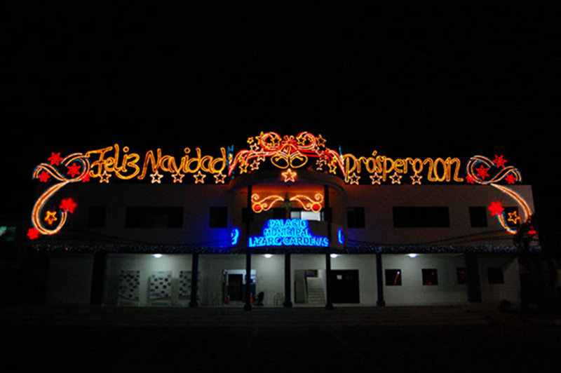 The main municipal building in Kantunilkin displays festive and bright holiday lights.