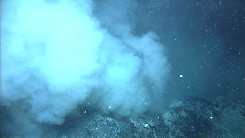 The rim of the pit crater at the cone volcano in the caldera of Volcano O. This crater is the prolific source of a sulfur particulate-rich plume, detected in several previous studies of the water column at Volcano O.