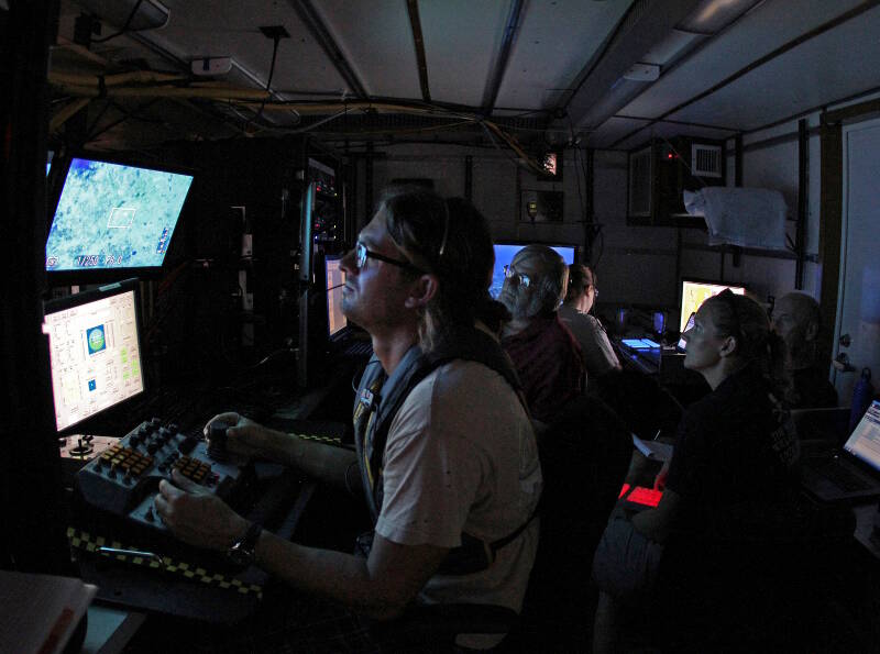 Jason White pilots the Mohawk remotely operated vehicle from the lab of the R/V Walton Smith