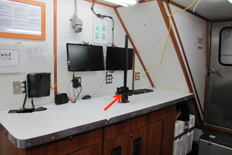 Fig. 3 - Sönke Johnsen's sparse equipment setup in the wetlab aboard the <em>R/V Pelican</em>.