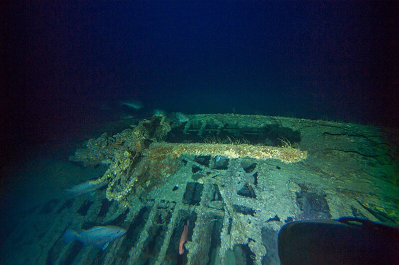 The 88mm deck gun of the U-576 was used for surface engagements and could fire a variety of shells from the watertight ready-ammunition locker which can be found forward of the gun on the port side. Image courtesy of Joe Hoyt, NOAA - Battle of the Atlantic expedition.