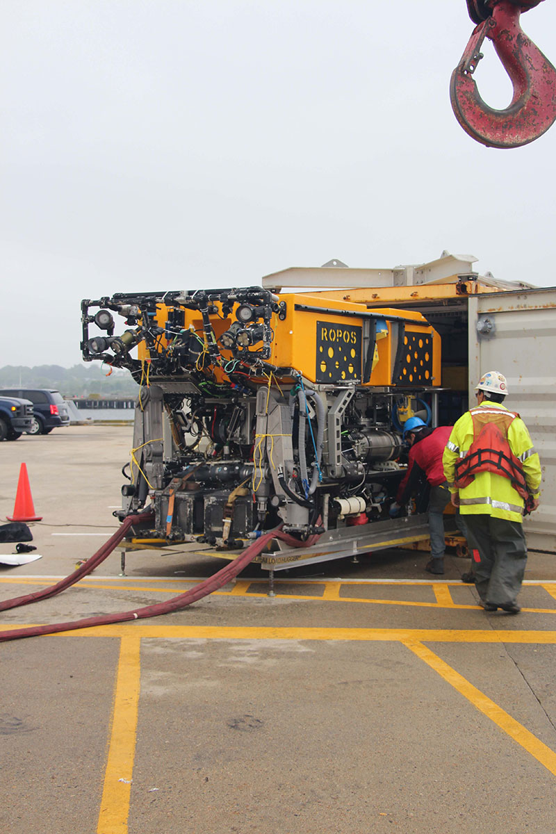 ROPOS is unloaded from its container onto the dock.