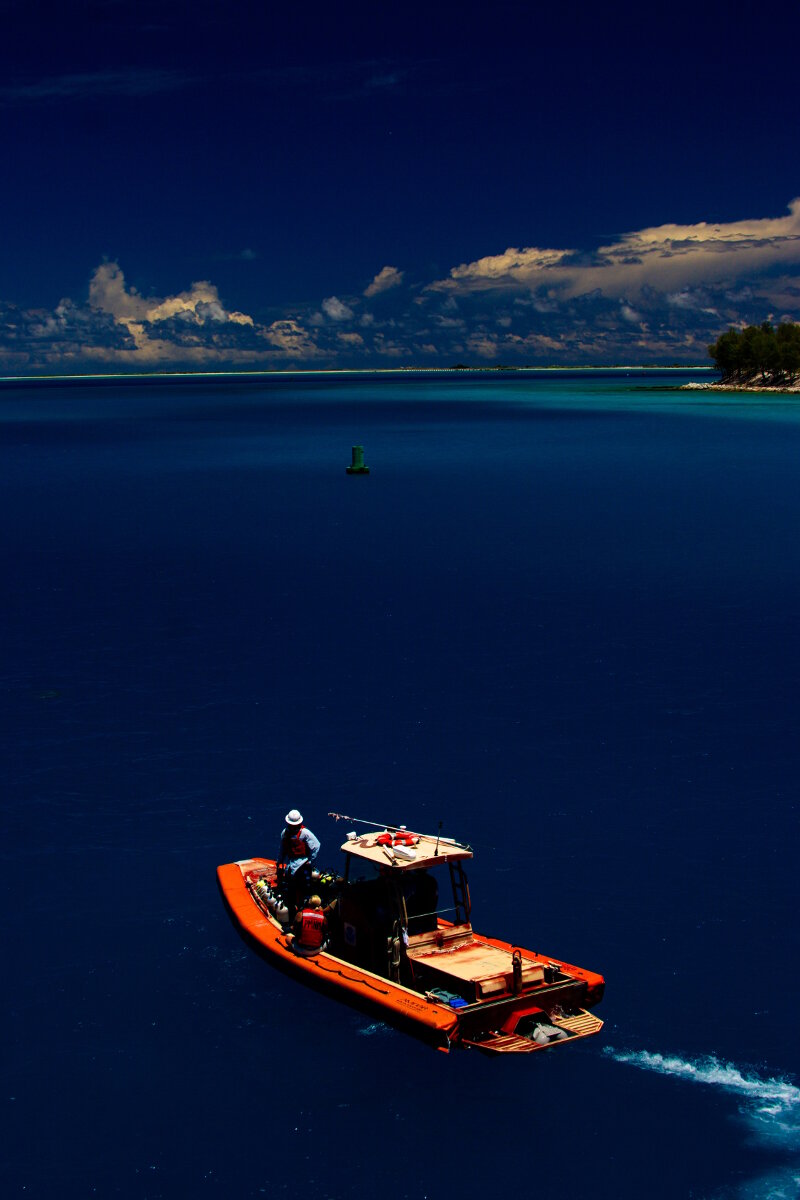 A team of maritime archaeologists prepare to survey at Midway Atoll.