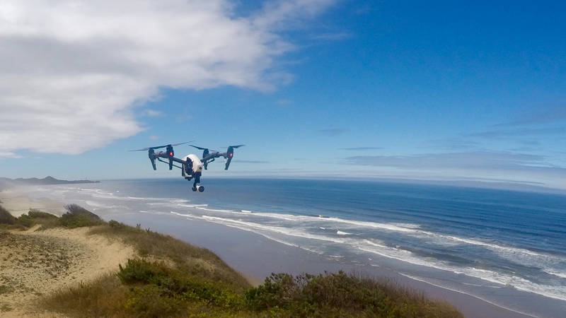 Example of camera-equipped quadcopter Unmanned Aircraft System in flight.