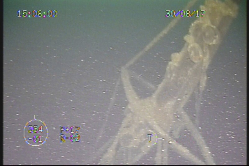 Moving towards the bow, ROV pilots followed standing rigging to reveal an intact foremast. These features included complete lower masts, mast heads, topmasts, rigging and intact trucks at the mast top. They were careful not to risk tangling the ROV in loose riggings and lines.