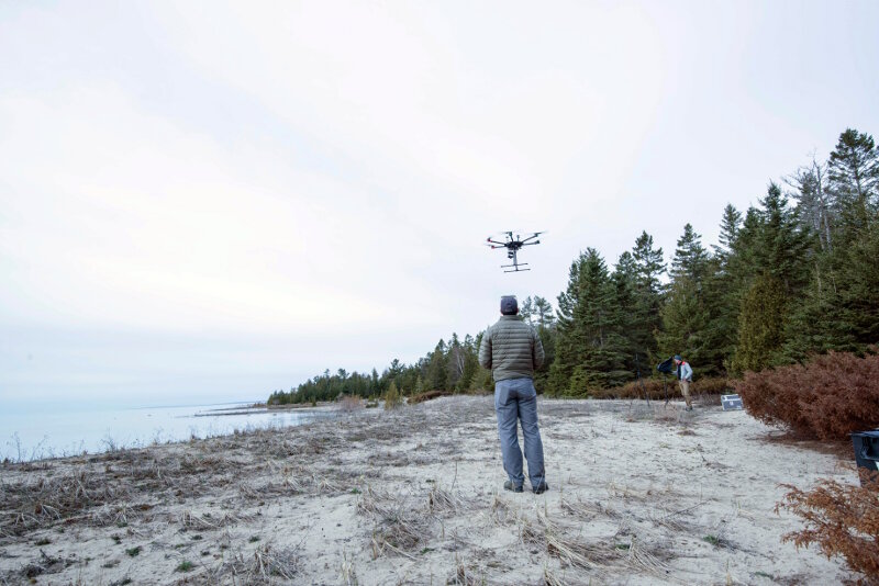 Pilot J.R. Gibbens controls a Matrice 600 during take-off for a survey mission at Thunder Bay’s North Point Reef.