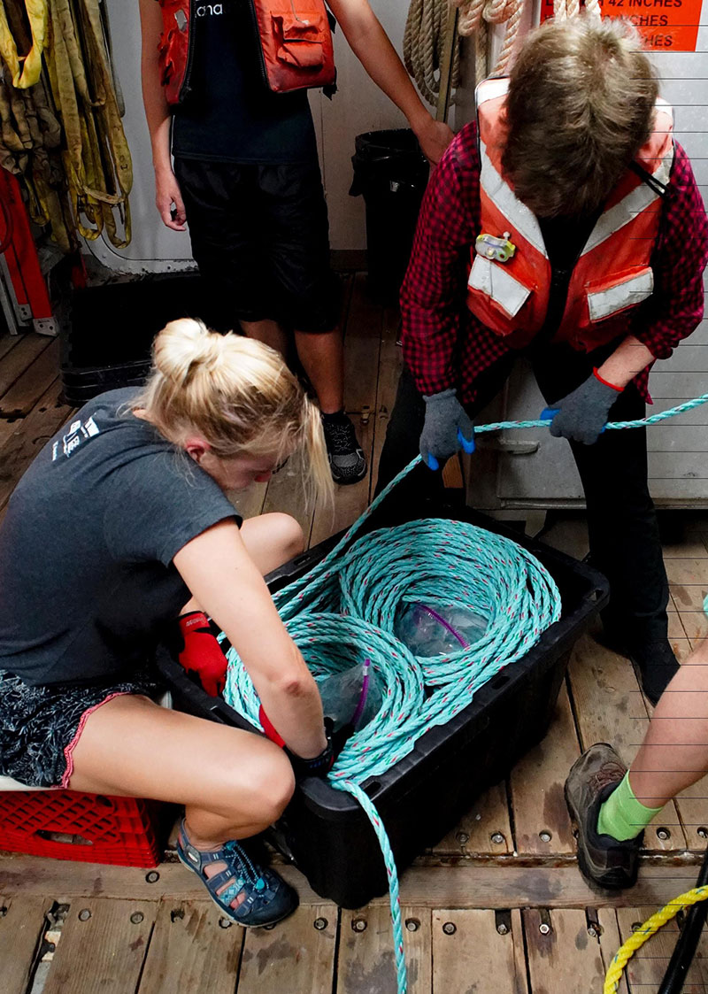 Recovering the Medusa requires a lot of line handling.  Here Heather Bracken-Grissom and Edie Widder coil line being pulled in by the capstan.