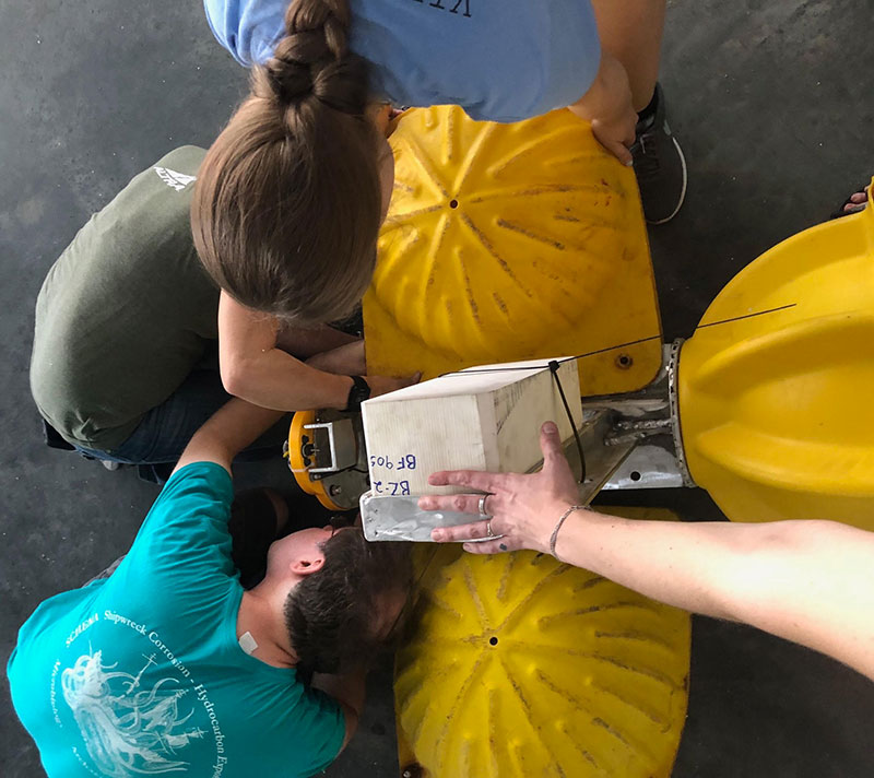 All hands on the lander – the final steps of putting together the lander, which will recover our experiments after four months, takes a team effort.