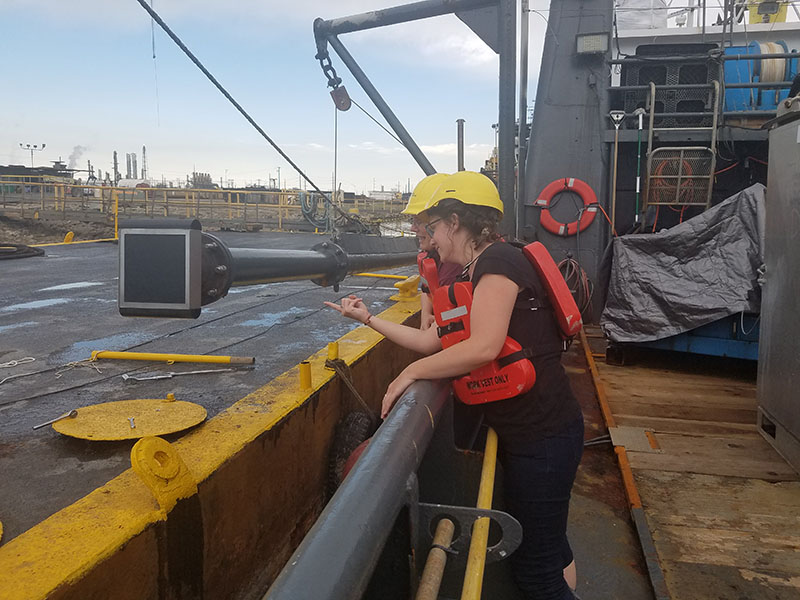 Metcalfe (front) and Tizzard (back) giving the installed parametric sonar system a final check.