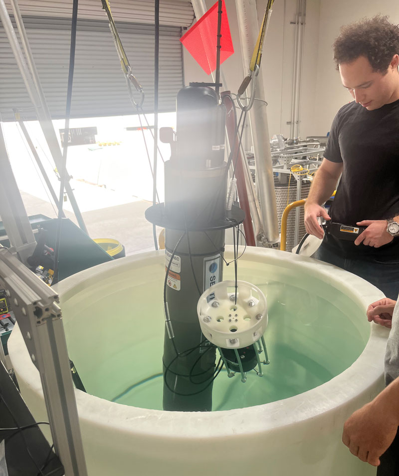 Seatrec Engineer Josh Laney conducting the final ballast test.