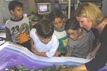 students looking at a map