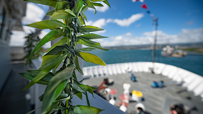 A lei lā’i adorns the bridge railing of NOAA Ship Okeanos Explorer. The lei lā’ī are made of ti leaves which are a significant plant in Hawaiian culture and utilized for ceremonial purposes.