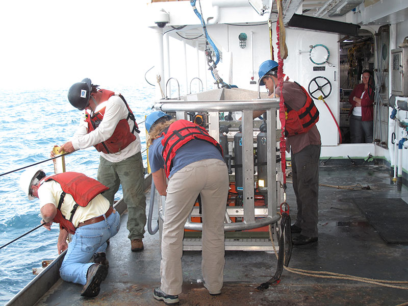 The crew prepares TowCam for deployment.