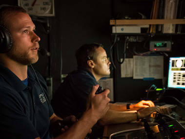 ROV pilot Chris Ritter practices controlling the new manipulator arm.