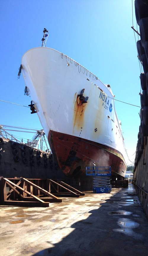 Once pulled out of the water, you can really appreciate the size of NOAA Ship Okeanos Explorer, including the parts of the ship that lay below the waterline that we rarely see.