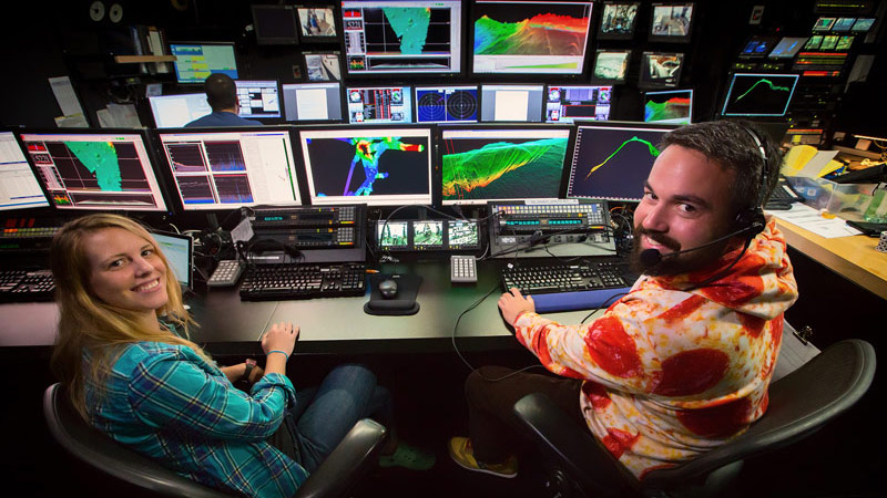 Mapping Team Lead, Lindsay McKenna Gray, and Senior Survey Tech, Charlie Wilkins, working in the control room.