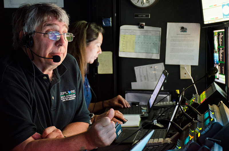 Onboard science lead Dr. Chris Kelley and NOAA EPP Intern Nikola Rodriguez discuss and take a closer look at deepwater habitats explored with ROV Deep Discoverer on Horizon Guyot. During the cruise, Nikola logged scientific observations during ROV dives and analyzed these annotations for a final project.