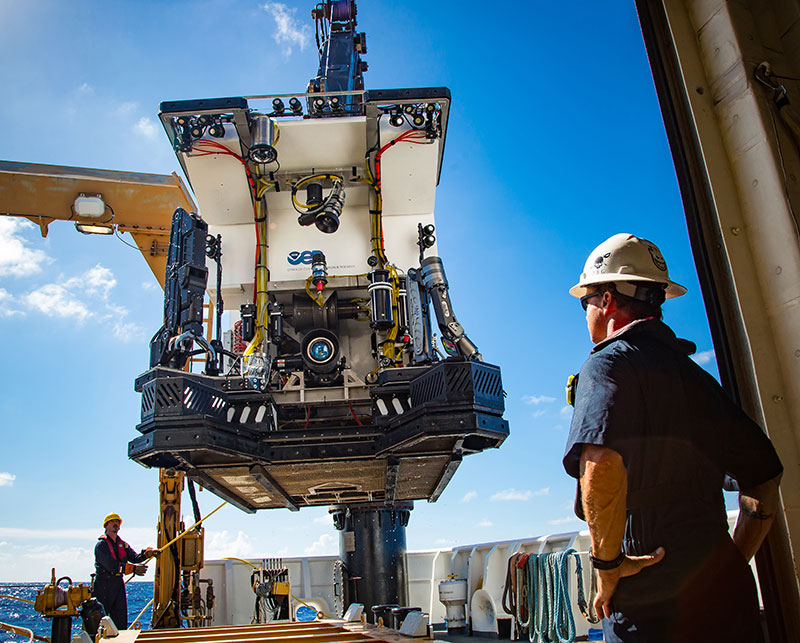 Chief Boatswain Jerrod Hozendorf watches as ROV Deep Discoverer is deployed from NOAA Ship Okeanos Explorer.