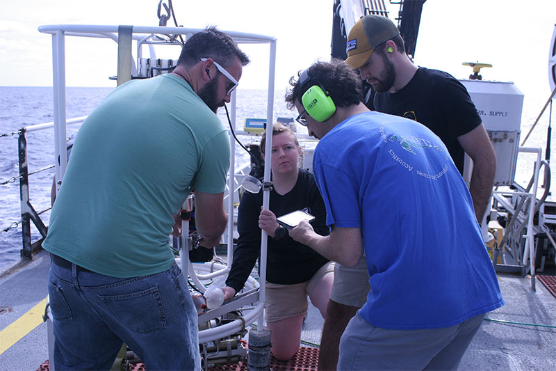 Allison and Josh work with Professor Licht and Charlie to find a mounting solution for the pressure housings.