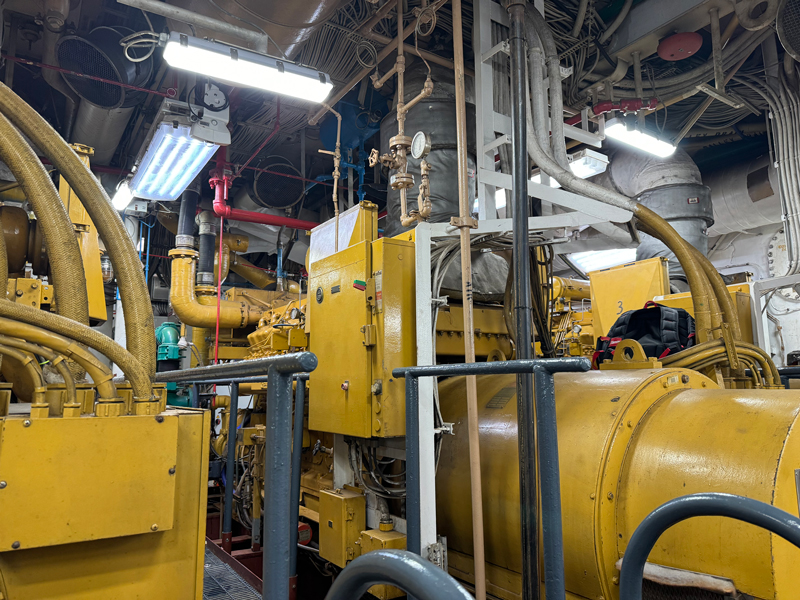 Image of another area of NOAA Ship Okeanos Explorer’s engine room. These machines were very loud so we all had to put on our noise-canceling headphones and ended up walking between the machines on a walkway where the gray bars are.